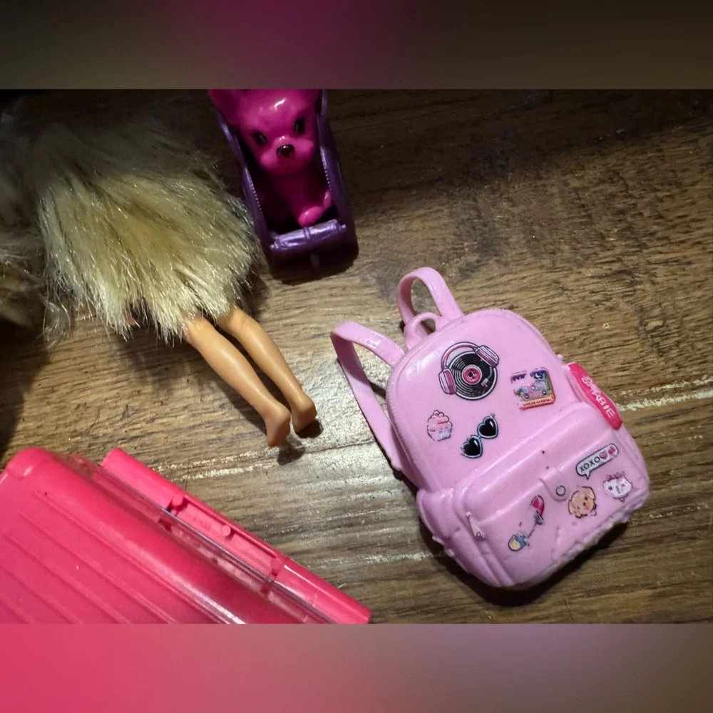 Barbie includes her